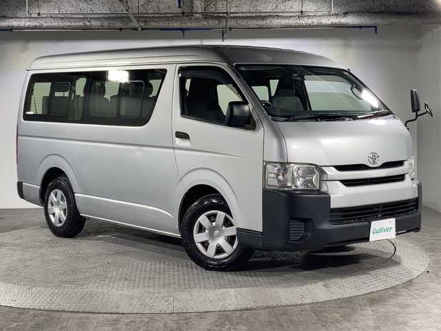 トヨタ ハイエース DX 沖縄県 2014(平26)年 3.5万km シルバーマイカM 禁煙車/１０名乗り/純正オーディオ/ＡＭ　ＦＭ/シートバックドリンクホルダー/リアアンダーミラー/片側スライドドア/純正ドアバイザー/前列フロアマット/ＡＢＳ/横滑り防止装置/キーレス/スペアキー