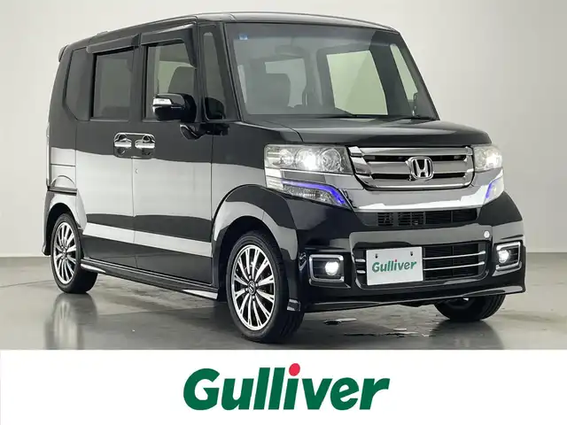 ホンダ Ｎ ＢＯＸ カスタム G ターボ Lパッケージ 愛知県 2015(平27)年 6.9万km スマートブラック 社外ナビ　両側パワスラ　バックカメラ　パドルシフト　禁煙車　フルセグ　DVD　ハーフレザー　クルコン　HIDオートライト　フォグランプ　ETC　純正フロアマット　Bluetooth　ECON　純正１５型AW　プッシュスタート　スマートキー