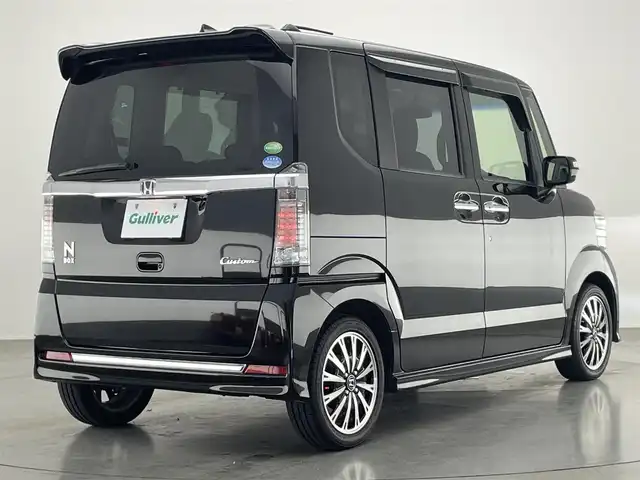 ホンダ Ｎ ＢＯＸ カスタム G ターボ Lパッケージ 愛知県 2015(平27)年 6.9万km スマートブラック 社外ナビ　両側パワスラ　バックカメラ　パドルシフト　禁煙車　フルセグ　DVD　ハーフレザー　クルコン　HIDオートライト　フォグランプ　ETC　純正フロアマット　Bluetooth　ECON　純正１５型AW　プッシュスタート　スマートキー