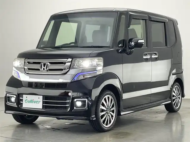 ホンダ Ｎ ＢＯＸ カスタム G ターボ Lパッケージ 愛知県 2015(平27)年 6.9万km スマートブラック 社外ナビ　両側パワスラ　バックカメラ　パドルシフト　禁煙車　フルセグ　DVD　ハーフレザー　クルコン　HIDオートライト　フォグランプ　ETC　純正フロアマット　Bluetooth　ECON　純正１５型AW　プッシュスタート　スマートキー