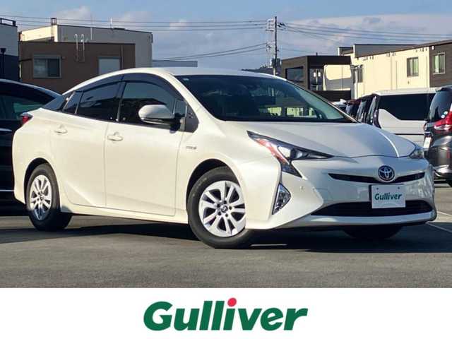 トヨタ プリウス Sセーフティプラス 静岡県 2018(平30)年 4.6万km ホワイトパールクリスタルシャイン エンジンスタートボタン/パワーウィンドウ/パワーステアリング/パーキングアシスト/アイドリングストップ/スマートキー/オートエアコン/レーダークルーズコントロール/ＥＴＣ2.0/純正9インチナビ（CD/DVD/BT/フルセグ）/バックカメラ/ドライブレコーダー/フロアマット/布シート/純正アルミホイール/ABS/横滑り防止装置/コーナーセンサー前後/レーンキープアシスト/オートライト/オートマチックハイビーム/LEDヘッドライト/Ｗ+サイドエアバッグ/衝突軽減システム