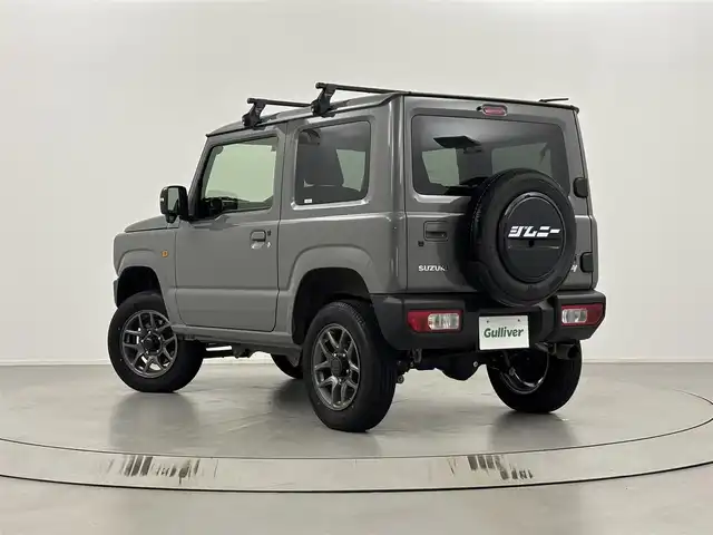 スズキ ジムニー XC 埼玉県 2022(令4)年 1.3万km ミディアムグレー 4WD/衝突被害軽減システム/社外マフラー（純正積み込み）/社外エアクリーナー（純正積み込み）/社外サス（純正積み込み）/社外オーディオDEH-5600/クルーズコントロール/オートLEDヘッドライト/電動格納ウィンカーミラー/シートヒーター/ETC/ルーフキャリア/純正フロアマット/背面タイヤ/スマートキー/プッシュスタート