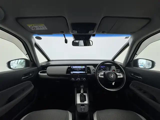 ホンダ フィット e:HEVクロスター 愛知県 2020(令2)年 5.6万km プレミアムサンライトホワイトパール 純正9インチナビ　/（フルセグ/BT/CD/DVD） /レーダークルーズコントロール　/バックモニター　/コーナーセンサー　/衝突軽減システム　/レーンキープアシスト　/オートライト　/電動格納ミラー　/ドライブレコーダー　/ETC/社外AW（BALMINUM）　