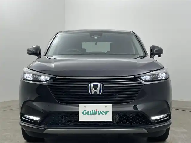ホンダ ヴェゼル ハイブリッド e:HEV X 岡山県 2022(令4)年 2.7万km クリスタルブラックパール ホンダセンシング/純正９インチディスプレイオーディオ/（ナビ/Ｂｌｕｅｔｏｏｔｈ/フルセグＴＶ/USB/Carplay）/衝突軽減ブレーキ/レーダークルーズコントロール/ビルトインＥＴＣ２．０/ドライブレコーダー（前後）/ＬＥＤヘッドライト/オートハイビーム/フォグランプ/バックカメラ/置くだけ充電/ドライブレコーダー/新車保証書/取扱説明書/スペアキー×１