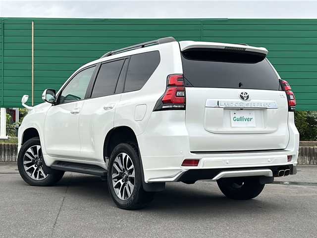 トヨタ ランドクルーザー プラド TX Lパッケージ 茨城県 2021(令3)年 1.9万km ホワイトパールクリスタルシャイン フルタイム4WD/モデリスタエアロ/サンルーフ/ALPINE9インチナビゲーション/CD/DVD/Bluetooth/フルセグTV/バックカメラ/Toyota Safety Sense/・プリクラッシュセーフティ/・レーンディパーチャーアラート/・オートマチックハイビーム/・レーダークルーズコントロール/・ロードサインアシスト/先行車発進告知/ビルトインETC/レザーシート/前席シートヒーター/エアシート/純正19インチAW/ルーフレール/オートライト/LEDヘッドライト