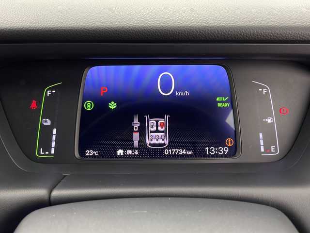 ホンダ フィット e:HEVリュクス 鹿児島県 2020(令2)年 1.8万km シャイニンググレーM ホンダセンシング　/●衝突軽減ブレーキ〈CMBS〉/●誤発進抑制機能/●後方誤発進抑制機能/●近距離衝突軽減ブレーキ/●歩行者事故低減ステアリング/●路外逸脱抑制機能/●渋滞追従機能付アダプティブ・クルーズ・コントロール〈ACC〉/●車線維持支援システム〈LKAS〉/●先行車発進お知らせ機能●標識認識機能/●オートハイビーム/純正９型ナビ　/前後ドライブレコーダー　/電子パーキング　/オートホールド　/ハンドルヒーター　/フォグライト　/LEDヘッドライト/ドアバイザー　/ウインカーミラー　/シートヒーター/ワイヤレス充電器/純正アルミホイール