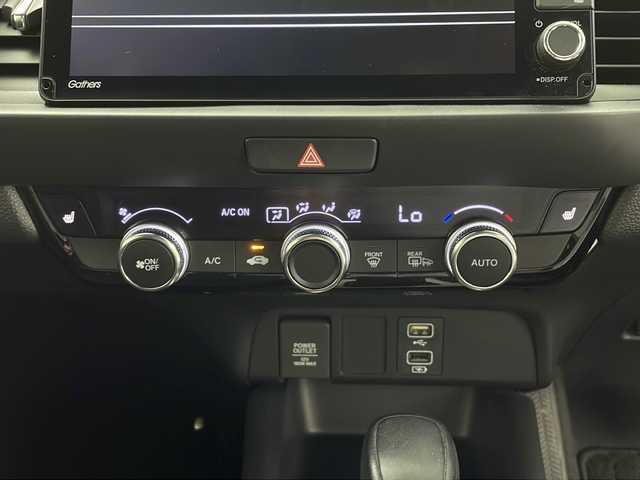 ホンダ フィット e:HEVリュクス 鹿児島県 2020(令2)年 1.8万km シャイニンググレーM ホンダセンシング　/●衝突軽減ブレーキ〈CMBS〉/●誤発進抑制機能/●後方誤発進抑制機能/●近距離衝突軽減ブレーキ/●歩行者事故低減ステアリング/●路外逸脱抑制機能/●渋滞追従機能付アダプティブ・クルーズ・コントロール〈ACC〉/●車線維持支援システム〈LKAS〉/●先行車発進お知らせ機能●標識認識機能/●オートハイビーム/純正９型ナビ　/前後ドライブレコーダー　/電子パーキング　/オートホールド　/ハンドルヒーター　/フォグライト　/LEDヘッドライト/ドアバイザー　/ウインカーミラー　/シートヒーター/ワイヤレス充電器/純正アルミホイール