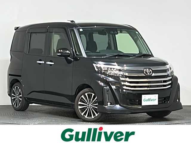 トヨタ ルーミー カスタムG－T 愛媛県 2023(令5)年 1.4万km ブラックマイカメタリック ・９型ナビ（フルセグＴＶ・ＢＴ・ＡＭＦＭ・ＣＤＤＶＤ・ＵＳＢ・ＳＤ・ＨＤＭＩ）/・全方位カメラ　/・ビルトインＥＴＣ２．０　/・前方ドラレコ　/・ＤＮ席シートヒーター　/・レーダークルーズコントロール　/・両側電動ドア/・前後コーナーセンサー/・衝突軽減ブレーキ/・レーンキープアシスト