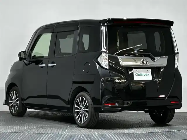 トヨタ ルーミー カスタムG－T 愛媛県 2023(令5)年 1.4万km ブラックマイカメタリック ・９型ナビ（フルセグＴＶ・ＢＴ・ＡＭＦＭ・ＣＤＤＶＤ・ＵＳＢ・ＳＤ・ＨＤＭＩ）/・全方位カメラ　/・ビルトインＥＴＣ２．０　/・前方ドラレコ　/・ＤＮ席シートヒーター　/・レーダークルーズコントロール　/・両側電動ドア/・前後コーナーセンサー/・衝突軽減ブレーキ/・レーンキープアシスト