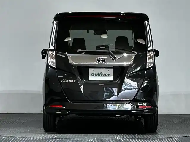 トヨタ ルーミー カスタムG－T 愛媛県 2023(令5)年 1.4万km ブラックマイカメタリック ・９型ナビ（フルセグＴＶ・ＢＴ・ＡＭＦＭ・ＣＤＤＶＤ・ＵＳＢ・ＳＤ・ＨＤＭＩ）/・全方位カメラ　/・ビルトインＥＴＣ２．０　/・前方ドラレコ　/・ＤＮ席シートヒーター　/・レーダークルーズコントロール　/・両側電動ドア/・前後コーナーセンサー/・衝突軽減ブレーキ/・レーンキープアシスト
