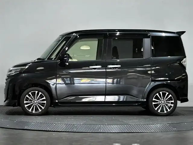 トヨタ ルーミー カスタムG－T 愛媛県 2023(令5)年 1.4万km ブラックマイカメタリック ・９型ナビ（フルセグＴＶ・ＢＴ・ＡＭＦＭ・ＣＤＤＶＤ・ＵＳＢ・ＳＤ・ＨＤＭＩ）/・全方位カメラ　/・ビルトインＥＴＣ２．０　/・前方ドラレコ　/・ＤＮ席シートヒーター　/・レーダークルーズコントロール　/・両側電動ドア/・前後コーナーセンサー/・衝突軽減ブレーキ/・レーンキープアシスト