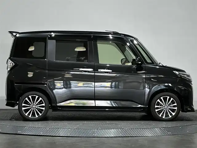 トヨタ ルーミー カスタムG－T 愛媛県 2023(令5)年 1.4万km ブラックマイカメタリック ・９型ナビ（フルセグＴＶ・ＢＴ・ＡＭＦＭ・ＣＤＤＶＤ・ＵＳＢ・ＳＤ・ＨＤＭＩ）/・全方位カメラ　/・ビルトインＥＴＣ２．０　/・前方ドラレコ　/・ＤＮ席シートヒーター　/・レーダークルーズコントロール　/・両側電動ドア/・前後コーナーセンサー/・衝突軽減ブレーキ/・レーンキープアシスト