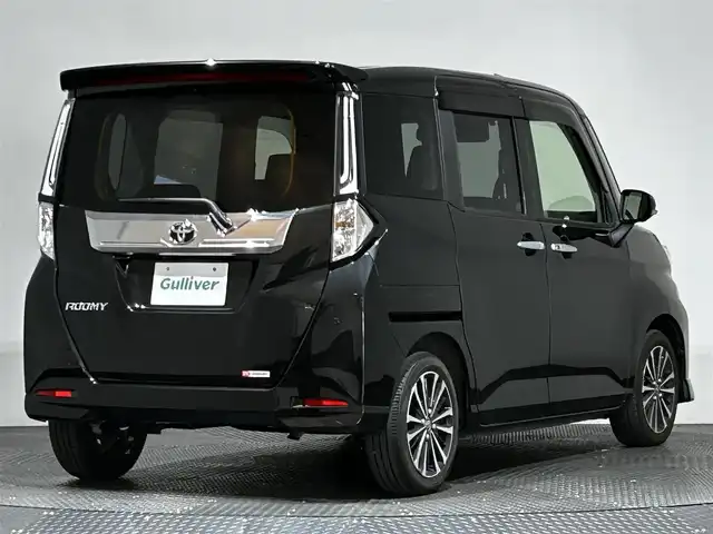 トヨタ ルーミー カスタムG－T 愛媛県 2023(令5)年 1.4万km ブラックマイカメタリック ・９型ナビ（フルセグＴＶ・ＢＴ・ＡＭＦＭ・ＣＤＤＶＤ・ＵＳＢ・ＳＤ・ＨＤＭＩ）/・全方位カメラ　/・ビルトインＥＴＣ２．０　/・前方ドラレコ　/・ＤＮ席シートヒーター　/・レーダークルーズコントロール　/・両側電動ドア/・前後コーナーセンサー/・衝突軽減ブレーキ/・レーンキープアシスト