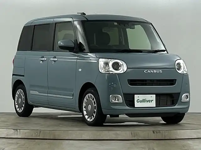 ダイハツ ムーヴ キャンバス セオリー G 愛知県 2022(令4)年 1.3万km レイクブルーメタリック 禁煙車/純正7インチディスプレイオーディオ/（AM/FM/CD/DVD/Bluetooth/USB)/バックカメラ/スマートアシストIII/・衝突軽減ブレーキ/。レーンキープアシスト/・オートマチックハイビーム/・クリアランスソナー/・誤発進抑制機能/ドライブレコーダー/シートヒーター/両側パワースライドドア/アイドリングストップ/スマートキー/スペアキー有/電子パーキング/オートホールド/純正フロアマット/横滑り防止装置/LEDヘッドライト/フロントフォグライト