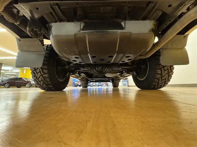 トヨタ ランドクルーザー プラド TX ワイド パッケージⅢ 群馬県 1998(平10)年 7.4万km ホワイト/シルバーM 8ナンバー登録/.ベッド【180×50】/・キャンピングタンク/・コンロ/社外SDナビ/　　iPod/USB/SD/CD/DVD/ワンセグ/バックカメラ/サンルーフ/ルーフレール/オートエアコン/シートカバー付/純正16インチアルミ/背面タイヤ/キャンピング/ETC