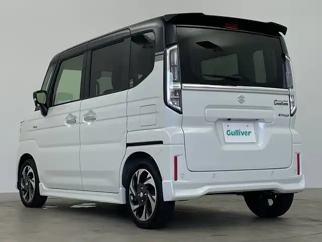 スズキ スペーシア カスタム HYBRID XS 鹿児島県 2024(令6)年 1.5万km ピュアホワイトパール/ブラック2トーン ワンオーナー/純正9インチナビ/（フルセグTV/BT/Applecarplay）/全方位モニター/ドライブレコーダー/デュアルセンサーブレーキサポート/レーンキープアシスト/ブレーキホールド/LEDライト/フォグLEDライト/ビルトインETC/ハーフレザーシート/シートヒーター（D＋N）/オットマン/両側パワースライドドア/純正15インチアルミホイール/アイドリングストップ/横滑り防止機能/フロアマット/ドアバイザー