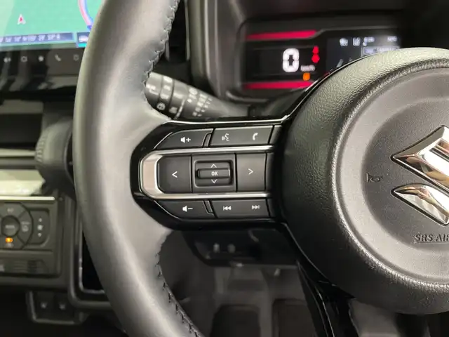 スズキ スペーシア カスタム HYBRID XS 鹿児島県 2024(令6)年 1.5万km ピュアホワイトパール/ブラック2トーン ワンオーナー/純正9インチナビ/（フルセグTV/BT/Applecarplay）/全方位モニター/ドライブレコーダー/デュアルセンサーブレーキサポート/レーンキープアシスト/ブレーキホールド/LEDライト/フォグLEDライト/ビルトインETC/ハーフレザーシート/シートヒーター（D＋N）/オットマン/両側パワースライドドア/純正15インチアルミホイール/アイドリングストップ/横滑り防止機能/フロアマット/ドアバイザー