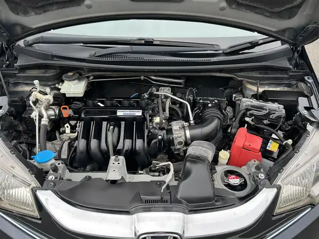 ホンダ フィット ハイブリット Lパッケージ 栃木県 2015(平27)年 7.6万km ミッドナイトブルービームM ホンダセンシング/純正7インチナビ/フルセグTV/DVD/Bluetooth/バックカメラ/ビルトインETC/前ドライブレコーダー/クルーズコントロール/プッシュスタート/ステアリングリモコン/LEDオートライト/アイドリングストップ/横滑り防止装置/純正フロアマット/ドアバイザー/電動格納ミラー