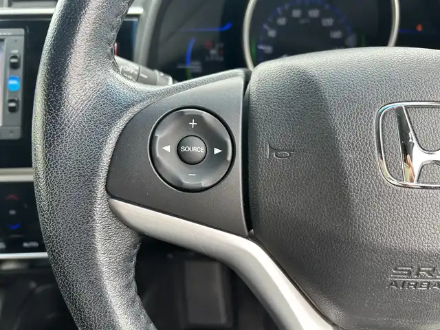 ホンダ フィット ハイブリット Lパッケージ 栃木県 2015(平27)年 7.6万km ミッドナイトブルービームM ホンダセンシング/純正7インチナビ/フルセグTV/DVD/Bluetooth/バックカメラ/ビルトインETC/前ドライブレコーダー/クルーズコントロール/プッシュスタート/ステアリングリモコン/LEDオートライト/アイドリングストップ/横滑り防止装置/純正フロアマット/ドアバイザー/電動格納ミラー