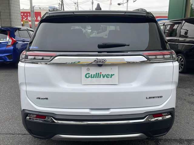 クライスラー・ジープ ジープ コマンダー リミテッド 東京都 2023(令5)年 1.5万km 白Ⅱ ワンオーナー/コマンドビューデュアルペインパノラミックサンルーフ/純正10.1インチタッチパネルモニター/サラウンドビューカメラ/衝突被害軽減ブレーキ/ハンズフリーパワーテールゲート/ハイウェイアシスト/アクティブレーンマネジメント/トラフィックサインアシスト/ヒルディセントコントロール/ステアリングスイッチ/革巻きステアリング/ステアリングヒーター/ミラーヒーター/クルーズコントロール/パークセンス/アクティブパークセンス/前後ドライブレコーダー/ビルトイン2.0ETC/ミュージックプレイヤー接続（USB.BT）/カーテンエアバック/純正18インチアルミホイール/純正フロアマット