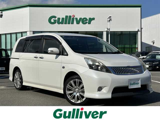 トヨタ アイシス プラタナ Vセレ ホワイトインテP 愛媛県 2012(平24)年 7.1万km ホワイトパールクリスタルシャイン 登録時走行距離：70282Km/ディーラーOP純正SDメモリーナビ/AM/FM/DVD/ワンセグTV/BT/バックカメラ/3列シート/エンジンスタートボタン/ＡＢS/キセノンヘッドライト/オートライト/フォグランプ/両側パワスラ/スマートキー/スペアキー1本/純正フロアマット/社外アルミホイール/フロント/リアエアロ