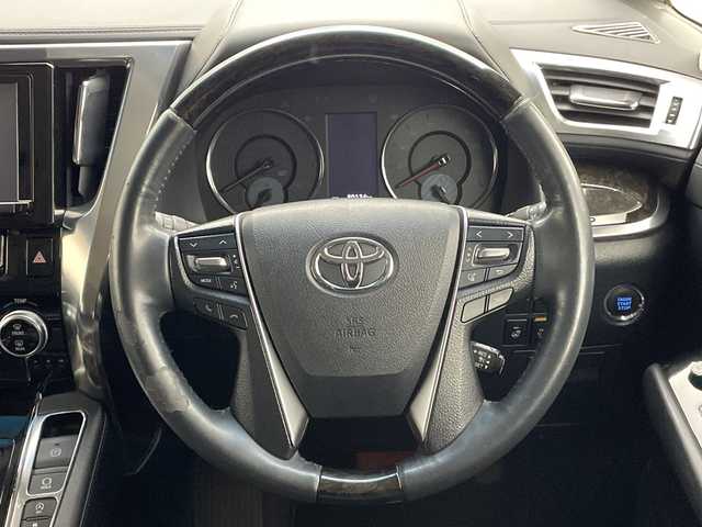 トヨタ ヴェルファイア Z Gエディション 新潟県 2015(平27)年 8.1万km バーニングブラッククリスタルシャインガラスフレーク プリクラッシュセーフティ/レーダークルーズントロール/インテリジェントクリアランスソナー/純正9インチディーラーOPナビ（NSZT-Y64T）/　・バックカメラ/　・フルセグTV/　・Bluetooth/　・HDMI/　・CD/DVD/SD再生機能/フリップダウンモニター/ビルトインETC/電動リアゲート/両側パワースライドドア/前席パワーシート/D席メモリシート/オートライト/LEDヘッドライト/プッシュスタート/ステアリングヒーター/ステアリングスイッチ/オートドアミラー/アイドリングストップ/純正フロアマット/ドアバイザー