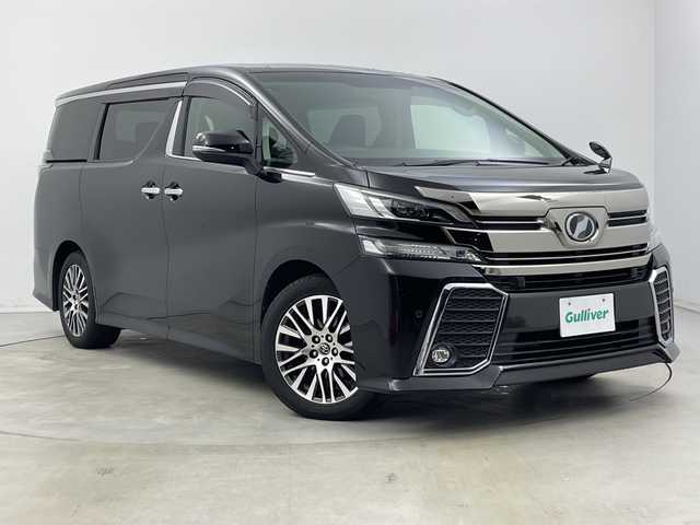 トヨタ ヴェルファイア Z Gエディション 新潟県 2015(平27)年 8.1万km バーニングブラッククリスタルシャインガラスフレーク プリクラッシュセーフティ/レーダークルーズントロール/インテリジェントクリアランスソナー/純正9インチディーラーOPナビ（NSZT-Y64T）/　・バックカメラ/　・フルセグTV/　・Bluetooth/　・HDMI/　・CD/DVD/SD再生機能/フリップダウンモニター/ビルトインETC/電動リアゲート/両側パワースライドドア/前席パワーシート/D席メモリシート/オートライト/LEDヘッドライト/プッシュスタート/ステアリングヒーター/ステアリングスイッチ/オートドアミラー/アイドリングストップ/純正フロアマット/ドアバイザー