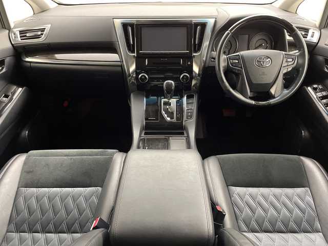 トヨタ ヴェルファイア Z Gエディション 新潟県 2015(平27)年 8.1万km バーニングブラッククリスタルシャインガラスフレーク プリクラッシュセーフティ/レーダークルーズントロール/インテリジェントクリアランスソナー/純正9インチディーラーOPナビ（NSZT-Y64T）/　・バックカメラ/　・フルセグTV/　・Bluetooth/　・HDMI/　・CD/DVD/SD再生機能/フリップダウンモニター/ビルトインETC/電動リアゲート/両側パワースライドドア/前席パワーシート/D席メモリシート/オートライト/LEDヘッドライト/プッシュスタート/ステアリングヒーター/ステアリングスイッチ/オートドアミラー/アイドリングストップ/純正フロアマット/ドアバイザー