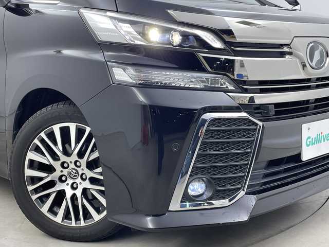 トヨタ ヴェルファイア Z Gエディション 新潟県 2015(平27)年 8.1万km バーニングブラッククリスタルシャインガラスフレーク プリクラッシュセーフティ/レーダークルーズントロール/インテリジェントクリアランスソナー/純正9インチディーラーOPナビ（NSZT-Y64T）/　・バックカメラ/　・フルセグTV/　・Bluetooth/　・HDMI/　・CD/DVD/SD再生機能/フリップダウンモニター/ビルトインETC/電動リアゲート/両側パワースライドドア/前席パワーシート/D席メモリシート/オートライト/LEDヘッドライト/プッシュスタート/ステアリングヒーター/ステアリングスイッチ/オートドアミラー/アイドリングストップ/純正フロアマット/ドアバイザー
