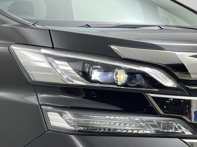 トヨタ ヴェルファイア Z Gエディション 新潟県 2015(平27)年 8.1万km バーニングブラッククリスタルシャインガラスフレーク プリクラッシュセーフティ/レーダークルーズントロール/インテリジェントクリアランスソナー/純正9インチディーラーOPナビ（NSZT-Y64T）/　・バックカメラ/　・フルセグTV/　・Bluetooth/　・HDMI/　・CD/DVD/SD再生機能/フリップダウンモニター/ビルトインETC/電動リアゲート/両側パワースライドドア/前席パワーシート/D席メモリシート/オートライト/LEDヘッドライト/プッシュスタート/ステアリングヒーター/ステアリングスイッチ/オートドアミラー/アイドリングストップ/純正フロアマット/ドアバイザー
