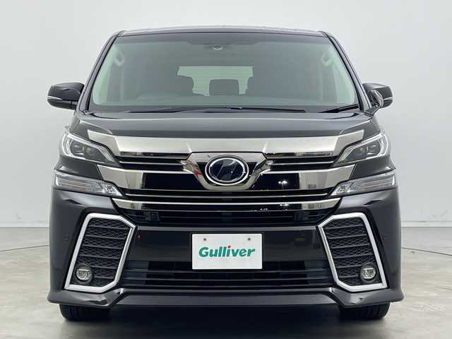 トヨタ ヴェルファイア Z Gエディション 新潟県 2015(平27)年 8.1万km バーニングブラッククリスタルシャインガラスフレーク プリクラッシュセーフティ/レーダークルーズントロール/インテリジェントクリアランスソナー/純正9インチディーラーOPナビ（NSZT-Y64T）/　・バックカメラ/　・フルセグTV/　・Bluetooth/　・HDMI/　・CD/DVD/SD再生機能/フリップダウンモニター/ビルトインETC/電動リアゲート/両側パワースライドドア/前席パワーシート/D席メモリシート/オートライト/LEDヘッドライト/プッシュスタート/ステアリングヒーター/ステアリングスイッチ/オートドアミラー/アイドリングストップ/純正フロアマット/ドアバイザー