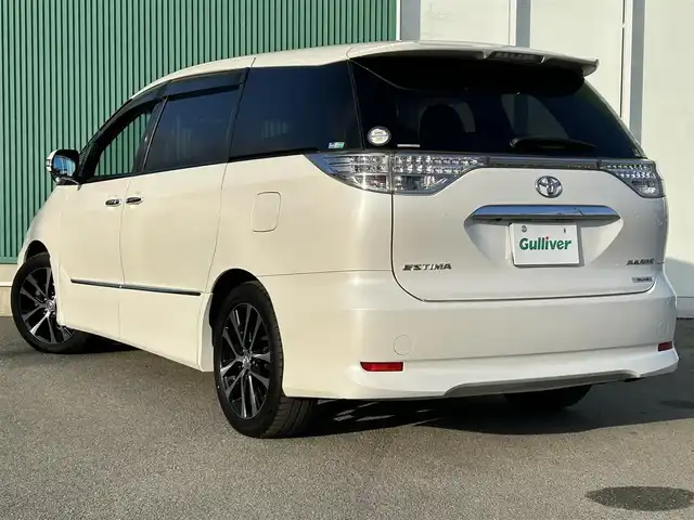 トヨタ エスティマ アエラス プレミアムエディション 福岡県 2013(平25)年 9万km ホワイトパールクリスタルシャイン ワンオーナー/HDDナビ/・バックカメラ/・フルセグTV/・BT/・CD/DVD/ビルトインETC/クルコン/両側パワスラ/前方ドラレコ/純正フロアマット/純正AW/HIDヘッドライト/オートライト/ハーフレザーシート/オットマン/三列シート/パワーシート(D席)