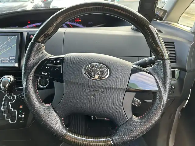 トヨタ エスティマ アエラス プレミアムエディション 福岡県 2013(平25)年 9万km ホワイトパールクリスタルシャイン ワンオーナー/HDDナビ/・バックカメラ/・フルセグTV/・BT/・CD/DVD/ビルトインETC/クルコン/両側パワスラ/前方ドラレコ/純正フロアマット/純正AW/HIDヘッドライト/オートライト/ハーフレザーシート/オットマン/三列シート/パワーシート(D席)