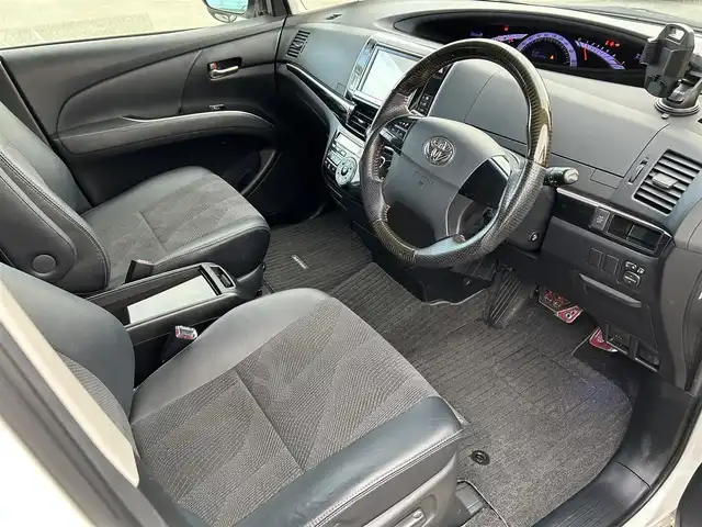 トヨタ エスティマ アエラス プレミアムエディション 福岡県 2013(平25)年 9万km ホワイトパールクリスタルシャイン ワンオーナー/HDDナビ/・バックカメラ/・フルセグTV/・BT/・CD/DVD/ビルトインETC/クルコン/両側パワスラ/前方ドラレコ/純正フロアマット/純正AW/HIDヘッドライト/オートライト/ハーフレザーシート/オットマン/三列シート/パワーシート(D席)