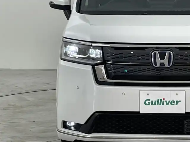 ホンダ ステップワゴン スパーダ eHEV 福岡県 2025(令7)年 0.1万km未満 プラチナホワイトパール 登録済未使用車　/純正ナビ　/Ｂカメラ　/ＡＣＣ　/コーナーセンサー　/衝突軽減　/レーンキープ　/ＢＳＭ　/踏み間違い防止　/パドルシフト　/両側電動スライドドア　/ハーフレザー　/シートヒーター　/パワーバックドア　/ＬＥＤ