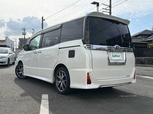 トヨタ ヴォクシー ZS 煌 愛知県 2015(平27)年 10.1万km ホワイトパールクリスタルシャイン /禁煙車//純正９インチナビ・フルセグTV/　(NSZT-Y64T)//ビルトインETC//バックカメラ//両側パワースライドドア//前後ドライブレコーダー//純正フリップダウンモニター/　(V11T-R62G)//LEDオートライト//プッシュスタート//モデリスタ１５インチアルミ//社外テールレンズ//電動格納ミラーウインカー//純正ドアバイザー//純正フロアマット//新車保証書