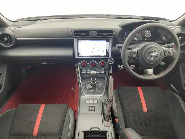 トヨタ ＧＲ８６ RZ 富山県 2023(令5)年 0.4万km クリスタルホワイトパール ワンオーナー/純正9インチナビ（AM/FM/CD/DVD/SD/USB/BT）/フルセグTV/バックカメラ/クルーズコントロール/後側方警戒支援システム/オートライト/LEDヘッドライト/レッドアクセント入りハーフレザーシート/前席シートヒーター/ドライブレコーダー前後/ETC/スマートキー×２/プッシュスタート/取扱説明書/保証書/ナビ取扱説明書