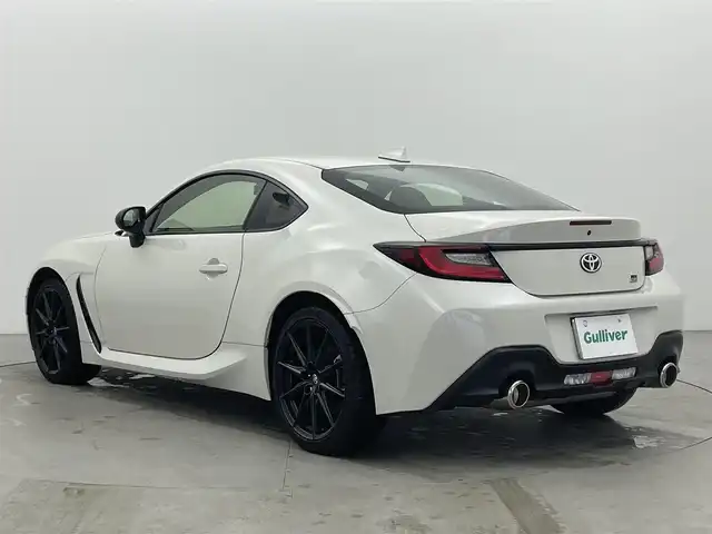 トヨタ ＧＲ８６ RZ 富山県 2023(令5)年 0.4万km クリスタルホワイトパール ワンオーナー/純正9インチナビ（AM/FM/CD/DVD/SD/USB/BT）/フルセグTV/バックカメラ/クルーズコントロール/後側方警戒支援システム/オートライト/LEDヘッドライト/レッドアクセント入りハーフレザーシート/前席シートヒーター/ドライブレコーダー前後/ETC/スマートキー×２/プッシュスタート/取扱説明書/保証書/ナビ取扱説明書