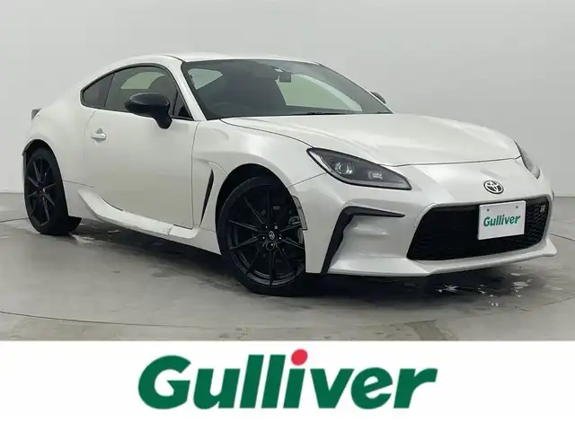 トヨタ ＧＲ８６ RZ 富山県 2023(令5)年 0.4万km クリスタルホワイトパール ワンオーナー/純正9インチナビ（AM/FM/CD/DVD/SD/USB/BT）/フルセグTV/バックカメラ/クルーズコントロール/後側方警戒支援システム/オートライト/LEDヘッドライト/レッドアクセント入りハーフレザーシート/前席シートヒーター/ドライブレコーダー前後/ETC/スマートキー×２/プッシュスタート/取扱説明書/保証書/ナビ取扱説明書