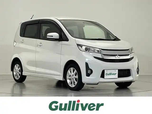 三菱 ｅＫカスタム G 滋賀県 2014(平26)年 2.8万km シルキーホワイト 禁煙車/オーディオ/AUX/MP3/CD/プッシュスタート/アイドリングストップ/革巻きステアリング/電格ミラー/フォグライト/キセノンライト/ウィンカーミラー
