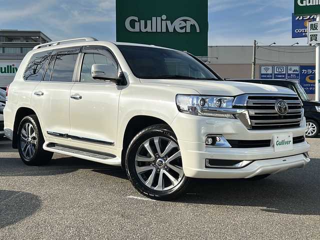 トヨタ ランドクルーザー ZX 石川県 2018(平30)年 5.5万km ホワイトパールクリスタルシャイン メーカーオプションSDナビ/(CD/DVD/Blu-ray/Bluetooth/SD/USB/AUX)/フルセグTV(キャンセラー有)/サンルーフ/リアエンターテイメント/全方位カメラ/モデリスタエアロ/JBLサウンド/保証書・取扱説明書/ワンオーナー/ルーフレール/電動リアゲート/電動格納サードシート/パワーシート(運転席・助手席)/レザーシート/シートヒーター・運転席/助手席/2列目/エアシート・運転席/助手席/クルーズコントロール(追従走行有)/前後コーナーセンサー/センターデフロック/ダウンヒルアシスト/ステアリングヒーター/ウッドコンビステアリング/ETC/社外レーダー