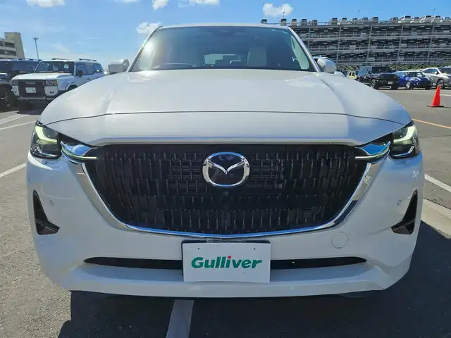 マツダ ＣＸ－６０ XD HV プレミアムモダン 香川県 2022(令4)年 3.7万km ロジウムホワイトプレミアムメタリック 4WD/パノラマサンルーフ/純正12.3型ナビ/フルセグTV/ハンズフリーパワーバックドア/レーダークルーズコントロール/パーキングセンサー/i-ACTIVSENSE/・スマートブレーキサポート/・誤発進抑制制御/・車線逸脱警報システム/・降車支援機能付ブラインドスポットモニタリング/・レーンキープアシストシステム/・緊急時車線維持支援/・前後接近車両検知/・クルージングトラフィックサポート/・交通標識認識システム/・ドライバー異常時対応システム/アクティブドライビングディスプレイ/アダプティブLEDヘッドランプ/ターボ/本革巻きステアリング/ステアリングヒーター/パドルシフト/ピュアホワイトナッパ革シート/全席シートヒーター/前席パワーシート/前席ベンチレーション/運転席ドライバーパーソナライズ/純正20インチアルミホイール/アドバンストキーレスエントリーシステム/禁煙車