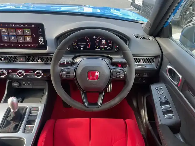 ホンダ シビック タイプR 福岡県 2023(令5)年 2.3万km レーシングブルーパール ワンオーナー/HONDAコネクトディスプレイナビ/　【Bluetooth/FM/USB/スマホ連携】/ブラインドスポットモニター/衝突軽減ブレーキ/アダブティブクルーズコントロール/パーキングセンサーシステム/オートハイビーム/路外逸脱抑制機能/車線維持支援システム/先行車発進お知らせ機能/歩行者事故低減ステアリング/後退出庫サポート/10.2インチデジタルグラフィックメーター/TYPE Rロゴスエードスポーツシート/電子制御パーキングブレーキ/純正19インチアルミ/純正オートLEDヘッドライト/純正アルカンターラ巻きステアリングホイール/純正トリプルマフラー/スマートキー/プッシュスタート/保証書/取扱説明書/スペアキー１本