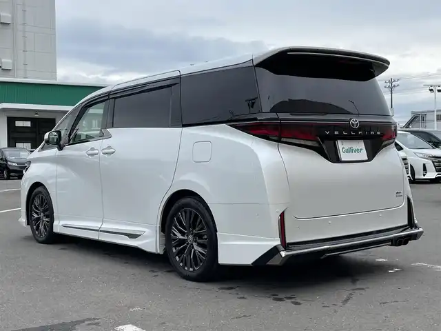 トヨタ ヴェルファイア ハイブリット Z プレミア 東京都 2023(令5)年 3万km プラチナホワイトパールマイカ メーカーナビ　/サンルーフ　/モデリスタエアロ　/置くだけ充電　/レーダークルーズコントロール/４WD　/前後ドラレコ/フルセグTV/シートメモリー　/電動リアゲート　/シートヒーター　/ベンチレーション　/本革シート　/純正フロアマット/純正アルミホイール/ＥＴＣ２．０/ABS/横滑り防止装置/レーンアシスト/パーキングサポート/ＢＳＭ　/ＨＵＤ　/盗難防止装置/オートマチックハイビーム/衝突軽減ブレーキ/安心降車アシスト/リヤカメラディテクション/プロアクティブドライビングアシスト/ロードサインアシスト