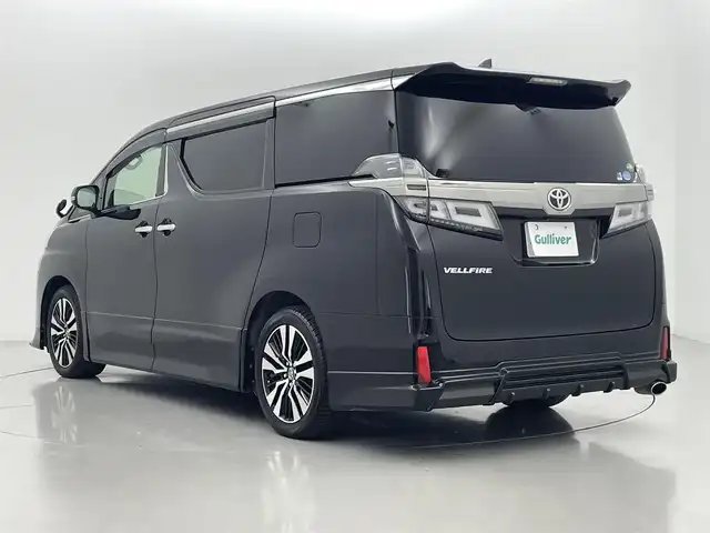 トヨタ ヴェルファイア Z Gエディション 熊本県 2018(平30)年 4.7万km ブラック ワンオーナー　/純正ナビNSZN-Z66T（ＣＤ・ＤＶＤ・フルセグ・ＢＴ・ＳＤ）/バックカメラ　/社外前方ドライブレコーダー　/純正フリップダウンモニター/ビルトインＥＴＣ　/両側パワースライドドア　/フルエアロ　/トヨタセーフティーセンス/・プリクラッシュセーフティ/・レーンキープアシスト/・ロードサインアシスト/・先行車発進お知らせ機能/・レーダークルーズコントロール/・オートマチックハイビーム/横滑り防止/前席シートヒーター/前席エアーシート/前席パワーシート/オットマン/ステアリングヒーター/パワーバックドア/社外フロアマット/純正１８インチAW/オートライト/LEDヘッドライト/フォグランプ/スマートキー/プッシュスタート/スペアキー1本/保証書/取扱説明書