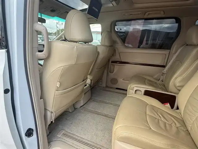 トヨタ アルファード 240G 香川県 2011(平23)年 9.8万km ホワイトパールクリスタルシャイン 社外HDDナビ/フルセグ/アルパインフリップダウンモニター/ダブルサンルーフ/両側パワースライドドア/クルーズコントロール/革調シートカバー/社外テール/ローダウン/ビルトインETC/スマートキー