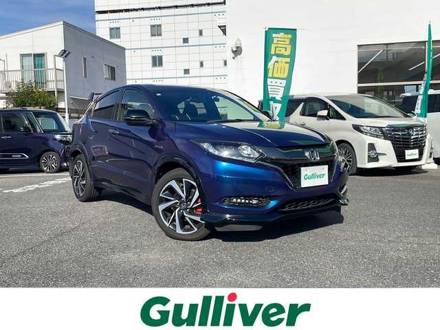 ホンダ ヴェゼル ハイブリッド RS ホンダセンシング 愛知県 2017(平29)年 3.5万km モルフォブルーP 純正HDDナビ/【フルセグ・DVD再生可・CD・Bluetooth】/バックカメラ/ビルトインETC/ホンダセンシング/【アダプティブクルーズコントロール・車線維持支援システム・路外逸脱抑制機能・歩行者事故逓減ステアリング・標識認識機能・先行車発進お知らせ機能・衝突被害ブレーキ・誤発進抑制機能】/前方ドライブレコーダー/社外マフラー（ＮＯ－ＢＬＥＳＳＥ）　/ステアリングスイッチ　/純正フロアマット　/プッシュスタート/スマートキー/新車保証書/取扱説明書
