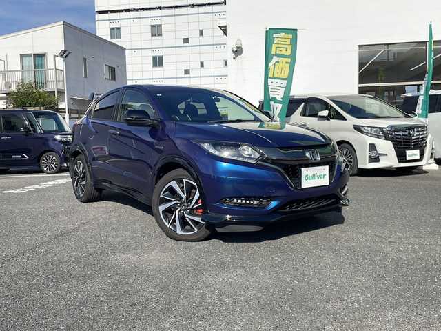 ホンダ ヴェゼル ハイブリッド RS ホンダセンシング 愛知県 2017(平29)年 3.5万km モルフォブルーP 純正HDDナビ/【フルセグ・DVD再生可・CD・Bluetooth】/バックカメラ/ビルトインETC/ホンダセンシング/【アダプティブクルーズコントロール・車線維持支援システム・路外逸脱抑制機能・歩行者事故逓減ステアリング・標識認識機能・先行車発進お知らせ機能・衝突被害ブレーキ・誤発進抑制機能】/前方ドライブレコーダー/社外マフラー（ＮＯ－ＢＬＥＳＳＥ）　/ステアリングスイッチ　/純正フロアマット　/プッシュスタート/スマートキー/新車保証書/取扱説明書