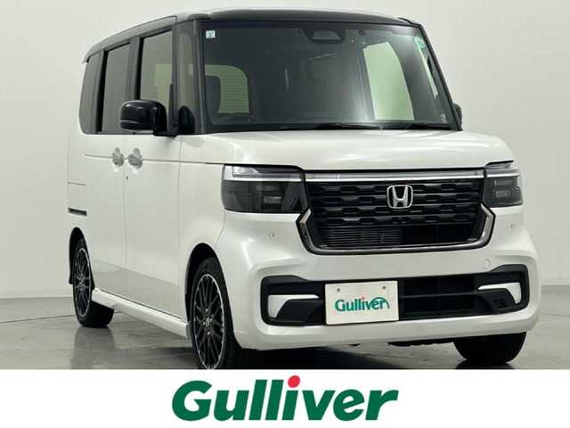 ホンダ Ｎ ＢＯＸ カスタム ターボ コーディネートS 熊本県 2024(令6)年 0.6万km パールⅡ 禁煙車　/純正9インチナビ（ＣＤ・ＤＶＤ・フルセグ・ＢＴ・ＳＤ・ＡｐｐｌＣａｒＰｌａｙ・ＡｎｄｒｏｉｄＡｕｔｏ・USB）/バックカメラ　/社外前方ドライブレコーダー　/ビルトインＥＴＣ　/両側パワースライドドア　/前席シートヒーター/衝突軽減ブレーキ/レーンキープアシスト/踏み間違い衝突軽減システム/車線逸脱警報/横滑り防止/アイドリングストップ/前後クリアランスソナー/ハーフレザーシート/ブレーキホールド/純正フロアマット/純正１５インチAW/オートライト/LEDヘッドライト/スマートキー/プッシュスタート/スペアキー1本
