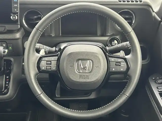 ホンダ Ｎ ＢＯＸ カスタム ターボ コーディネートS 熊本県 2024(令6)年 0.6万km パールⅡ 禁煙車　/純正9インチナビ（ＣＤ・ＤＶＤ・フルセグ・ＢＴ・ＳＤ・ＡｐｐｌＣａｒＰｌａｙ・ＡｎｄｒｏｉｄＡｕｔｏ・USB）/バックカメラ　/社外前方ドライブレコーダー　/ビルトインＥＴＣ　/両側パワースライドドア　/前席シートヒーター/衝突軽減ブレーキ/レーンキープアシスト/踏み間違い衝突軽減システム/車線逸脱警報/横滑り防止/アイドリングストップ/前後クリアランスソナー/ハーフレザーシート/ブレーキホールド/純正フロアマット/純正１５インチAW/オートライト/LEDヘッドライト/スマートキー/プッシュスタート/スペアキー1本